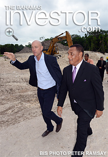 Mark Holowesko shows Prime Minister Perry Christie the site for the Mahogany Hill boutique hotel