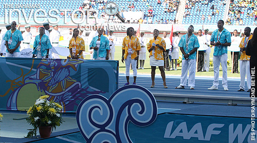 Bahamian Elite Athletes line the track during the opening ceremony